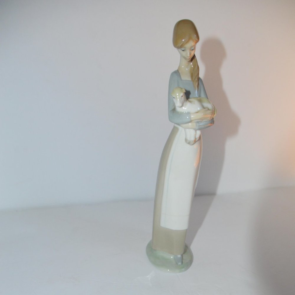 Vintage Lladro Girl Holding Lamb (lamb has broken ears)